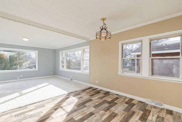 27569 N Beech St, Island Lake, IL 60042 - unfurnished room featuring wood finished floors, crown molding, baseboards, and a chandelier