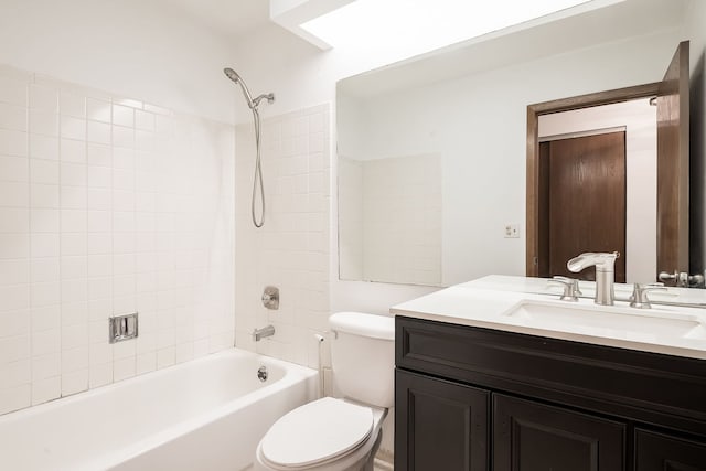 full bathroom with toilet,  shower combination, and vanity