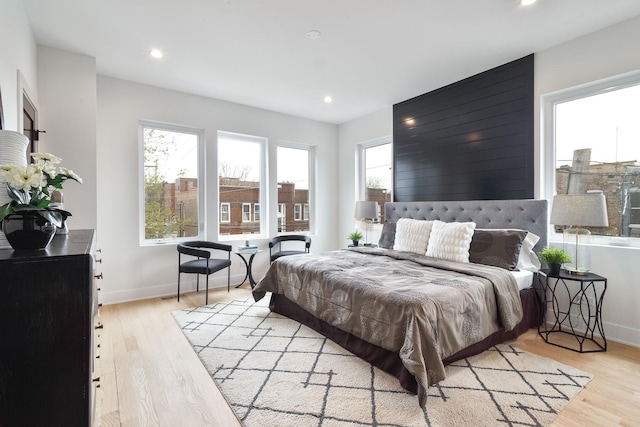 4014 N Kimball Ave, Chicago, IL 60618 - bedroom with recessed lighting, multiple windows, and light wood finished floors