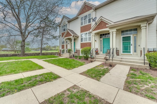 multi unit property with a front lawn