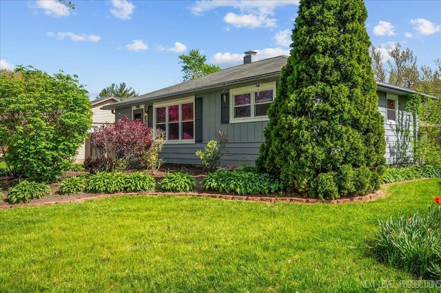3005 Starling Ln, Rolling Meadows, IL 60008 - view of side of property featuring board and batten siding and a yard