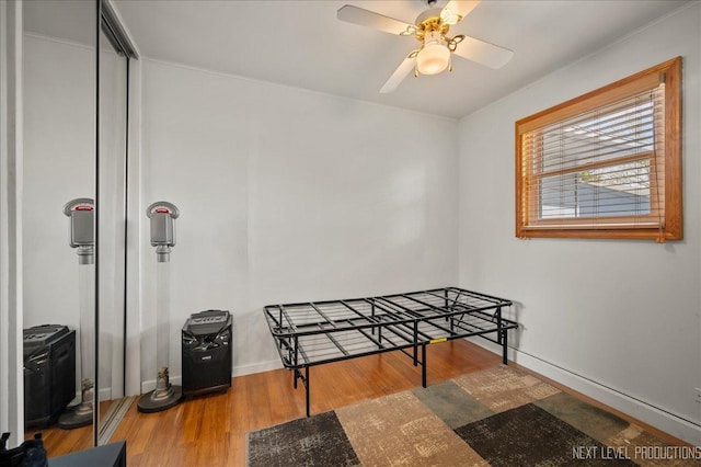 3005 Starling Ln, Rolling Meadows, IL 60008 - living area with wood finished floors, baseboards, and ceiling fan