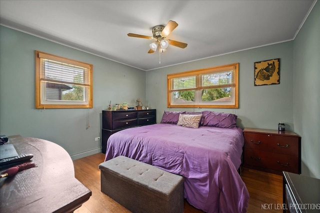 3005 Starling Ln, Rolling Meadows, IL 60008 - bedroom with wood finished floors, ornamental molding, baseboards, and a ceiling fan