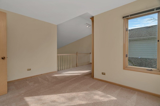 7017 Plymouth Ct, Tinley Park, IL 60477 - additional living space with carpet flooring, baseboards, and lofted ceiling