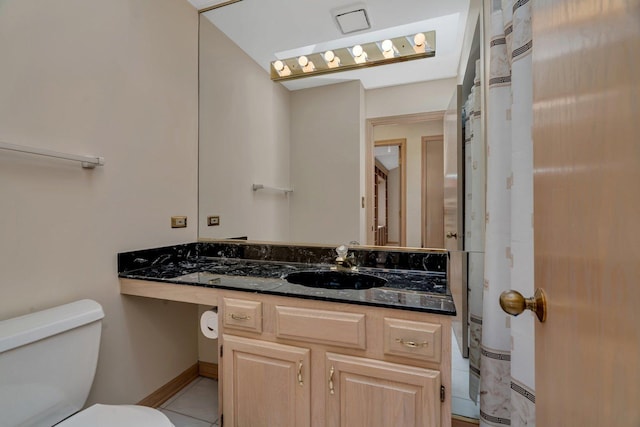 7017 Plymouth Ct, Tinley Park, IL 60477 - bathroom with toilet, tile patterned floors, and vanity