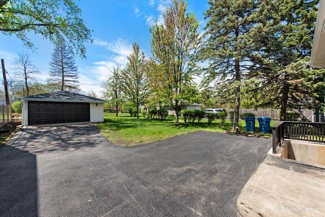4430 Roslyn Rd, Downers Grove, IL 60515 - exterior space with an outbuilding, a garage, and fence
