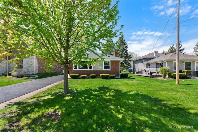 4430 Roslyn Rd, Downers Grove, IL 60515 - view of front of property with a chimney and a front lawn