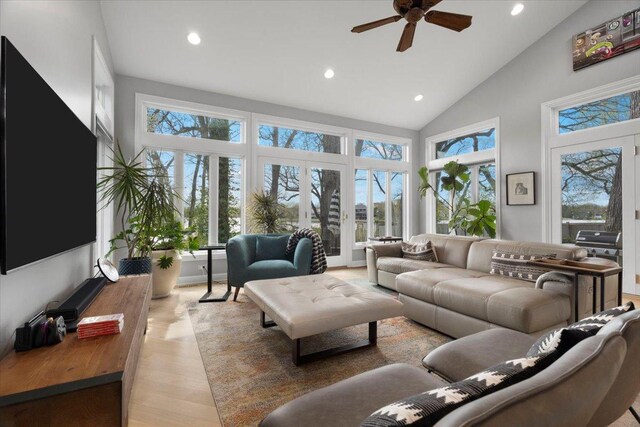 living area with recessed lighting, ceiling fan, and a healthy amount of sunlight