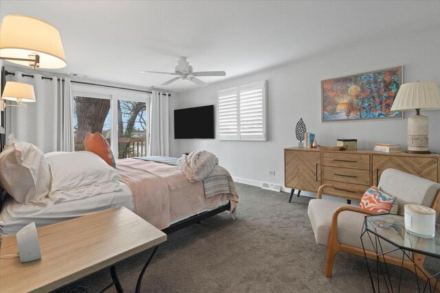 bedroom featuring carpet floors, baseboards, ceiling fan, and visible vents
