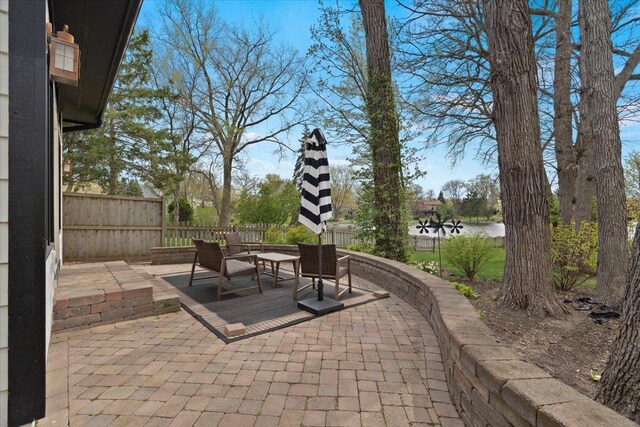 view of patio with fence