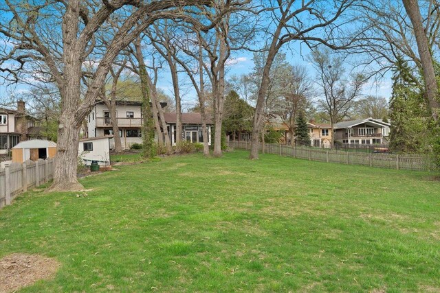 view of yard with fence