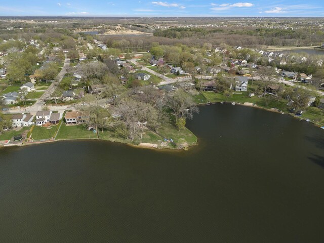 aerial view with a water view and a residential view