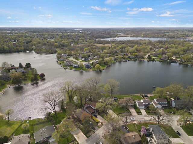 bird's eye view with a water view and a residential view