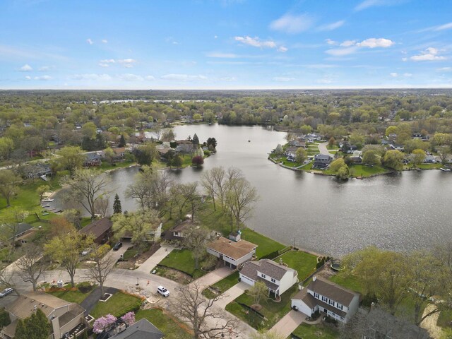 aerial view with a residential view and a water view
