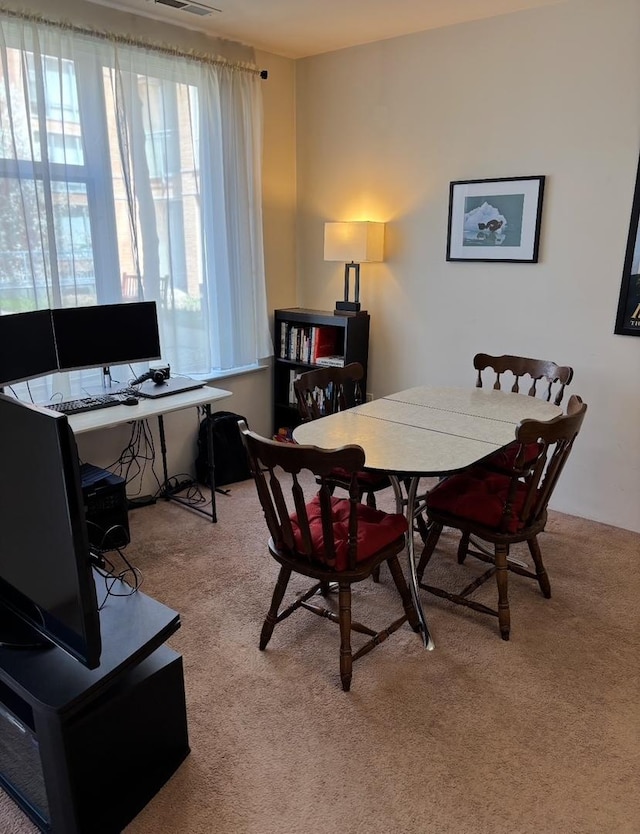 dining room with carpet flooring