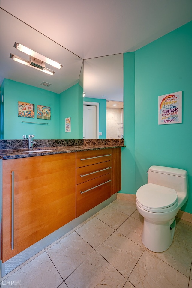 600 N Kingsbury St Unit 1902, Chicago, IL 60654 - bathroom featuring toilet, visible vents, marble finish floor, and vanity