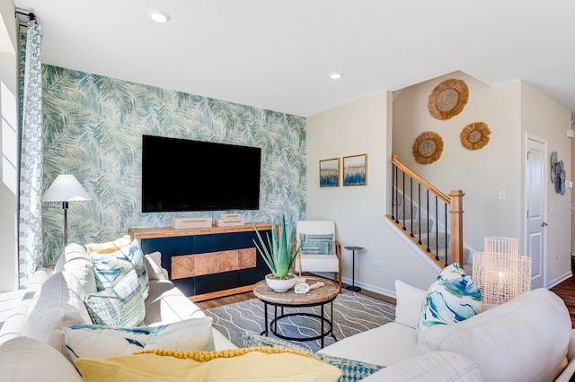 1909 Neubauer Cir Unit 1001, Lindenhurst, IL 60046 - living area featuring an accent wall, wallpapered walls, wood finished floors, baseboards, and stairs