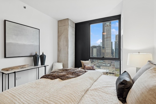 bedroom with a skyline view