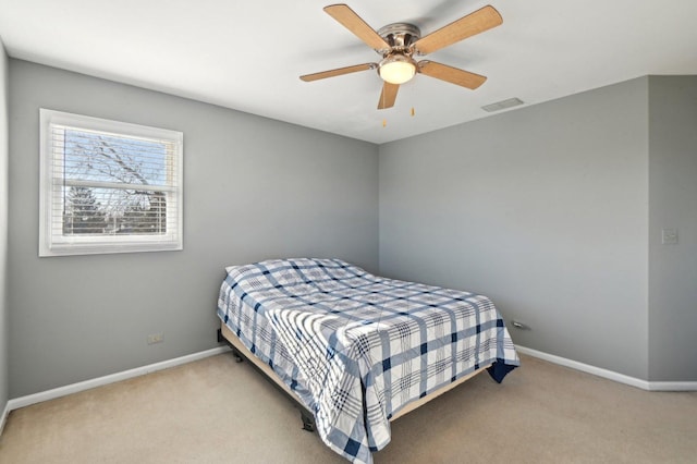 bedroom with visible vents, carpet, ceiling fan, and baseboards