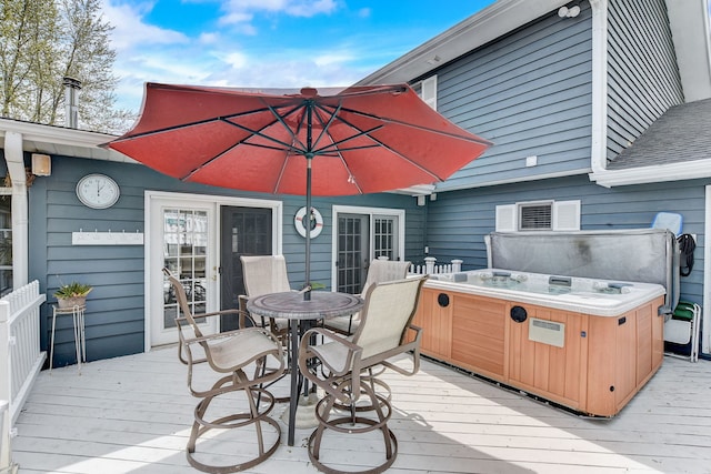 wooden deck featuring outdoor dining space