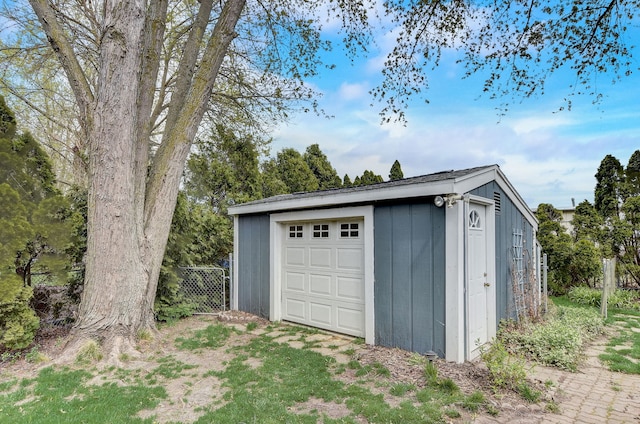 garage with fence