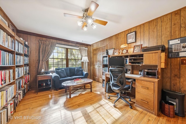 1525 Swallow St, Naperville, IL 60565 - office with ceiling fan, wooden walls, and light wood-type flooring