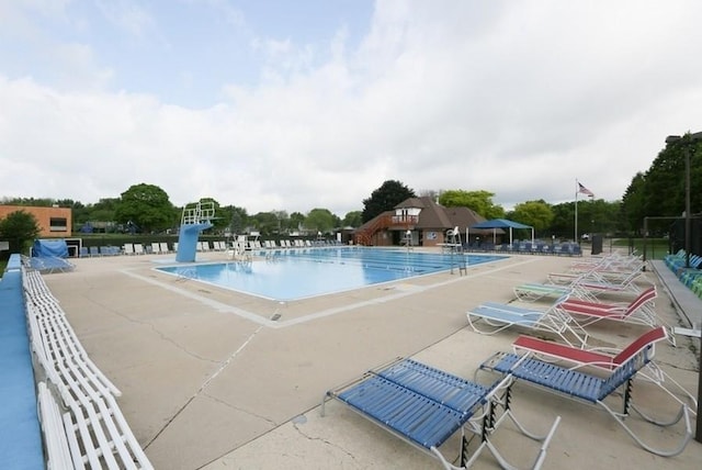 1525 Swallow St, Naperville, IL 60565 - community pool featuring a patio