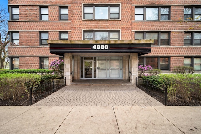 4880 N Marine Dr Unit 614, Chicago, IL 60640 - property entrance featuring brick siding and stone siding