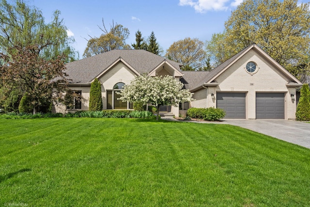 396 Crestwood Rd, Wood Dale, IL 60191 - single story home featuring brick siding, driveway, a front yard, and a garage