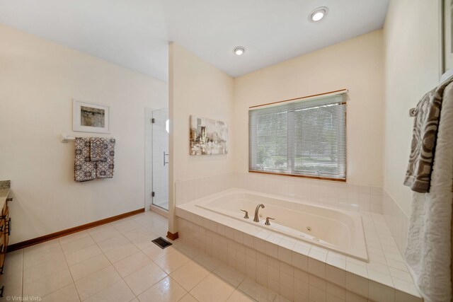 396 Crestwood Rd, Wood Dale, IL 60191 - full bath with a tub with jets, a stall shower, tile patterned flooring, baseboards, and vanity
