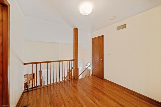 396 Crestwood Rd, Wood Dale, IL 60191 - spare room with wood finished floors and a smoke detector