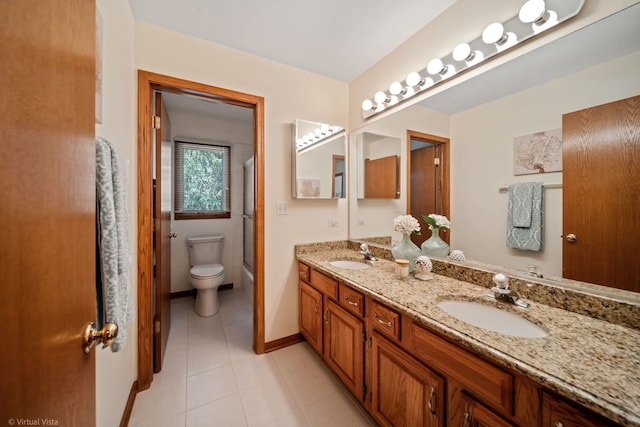 396 Crestwood Rd, Wood Dale, IL 60191 - full bathroom featuring double vanity, toilet, baseboards, tile patterned flooring, and a shower