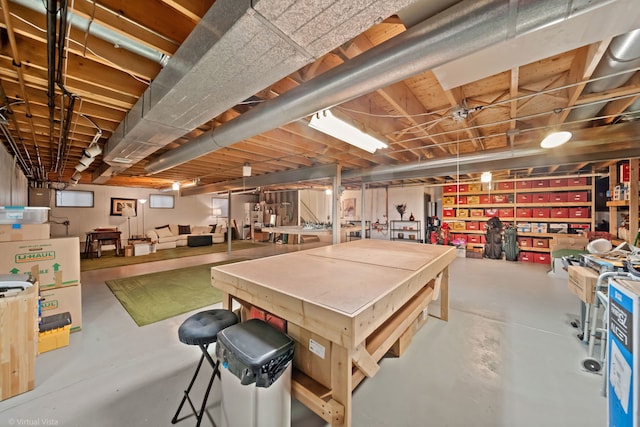 396 Crestwood Rd, Wood Dale, IL 60191 - recreation room with concrete floors and a workshop area