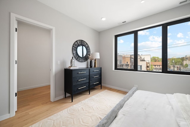 2248 W N Ave Unit 2, Chicago, IL 60647 - bedroom featuring recessed lighting, baseboards, visible vents, and light wood-style floors