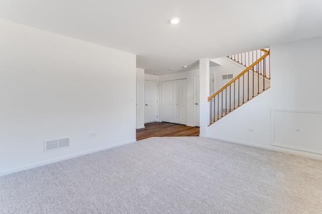3705 Neubauer Cir Unit 103, Lindenhurst, IL 60046 - unfurnished room featuring dark carpet, baseboards, stairs, and recessed lighting