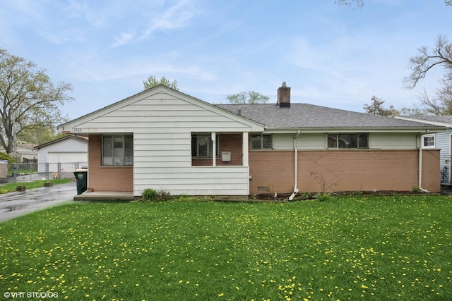 rear view of property featuring brick siding, a chimney, and an outdoor structure