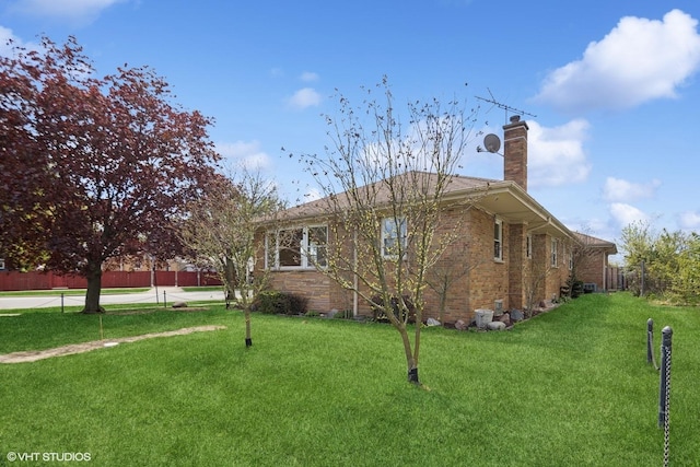 7010 W Devon Ave, Chicago, IL 60631 - view of side of property featuring a chimney and brick siding