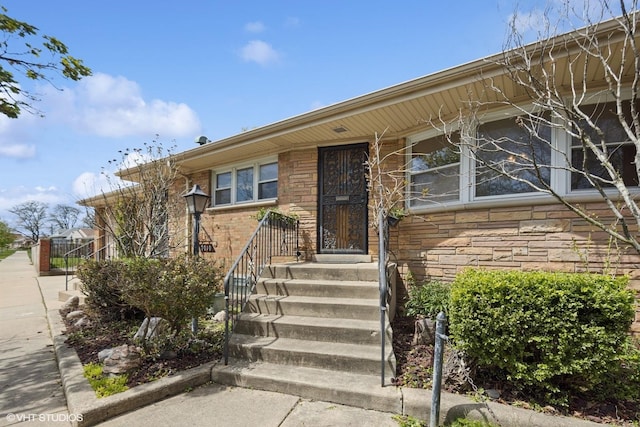 7010 W Devon Ave, Chicago, IL 60631 - entrance to property with stone siding