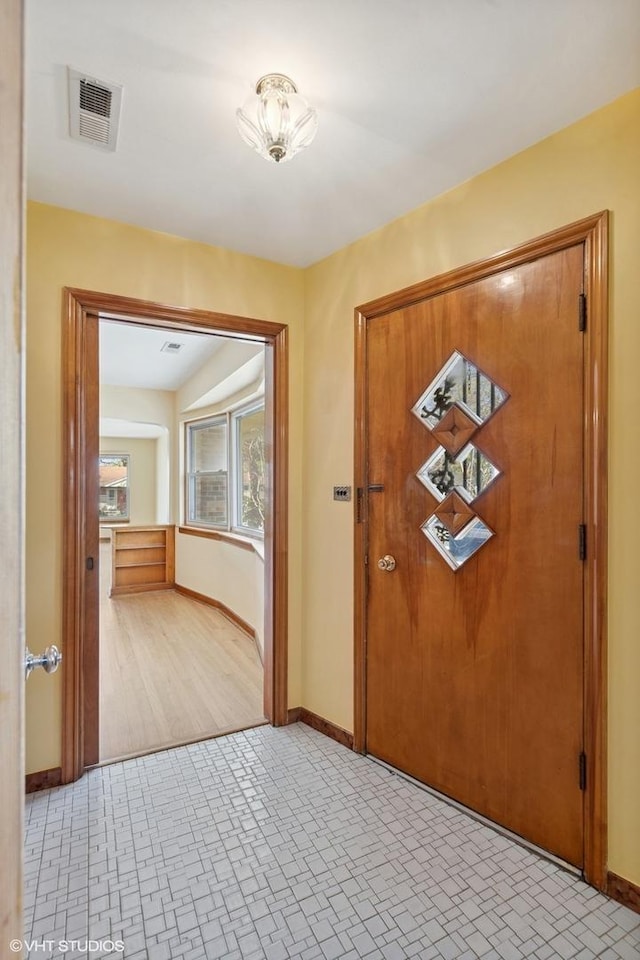 7010 W Devon Ave, Chicago, IL 60631 - entrance foyer featuring baseboards