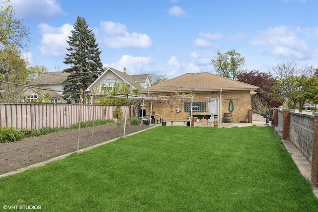 7010 W Devon Ave, Chicago, IL 60631 - rear view of property with a patio, brick siding, and a shingled roof