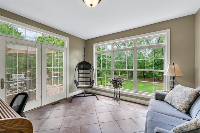 home office with tile patterned flooring and baseboards