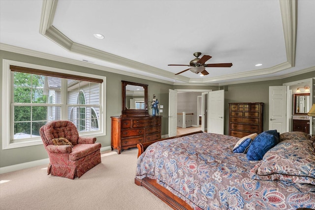 bedroom with a raised ceiling, crown molding, baseboards, carpet flooring, and recessed lighting