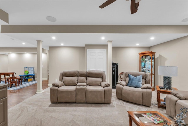 living room with recessed lighting, ceiling fan, light carpet, baseboards, and decorative columns