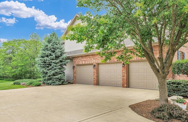 garage featuring driveway