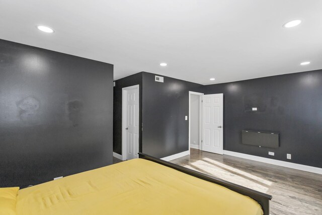 900 Center St Unit 2I, Des Plaines, IL 60016 - bedroom with recessed lighting, baseboards, and wood finished floors