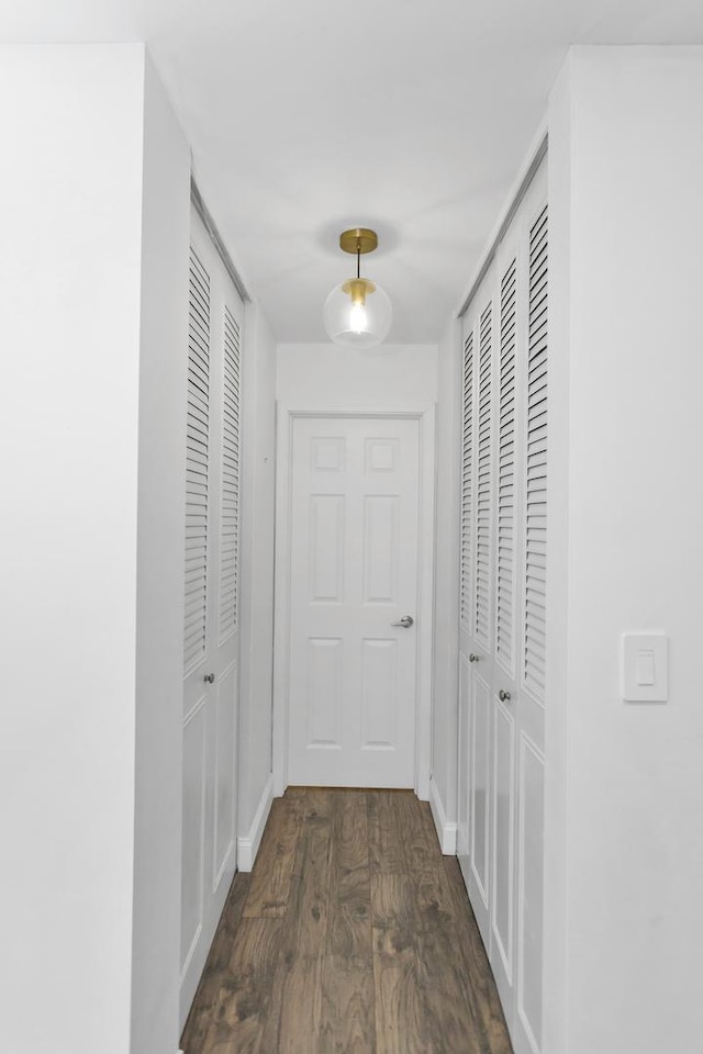 900 Center St Unit 2I, Des Plaines, IL 60016 - hallway featuring baseboards and dark wood-style floors