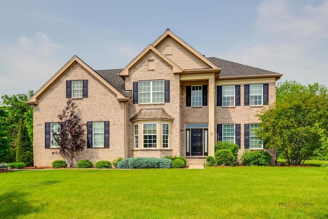 2550 Bayswater Cir, Gurnee, IL 60031 - view of front of home with brick siding and a front lawn