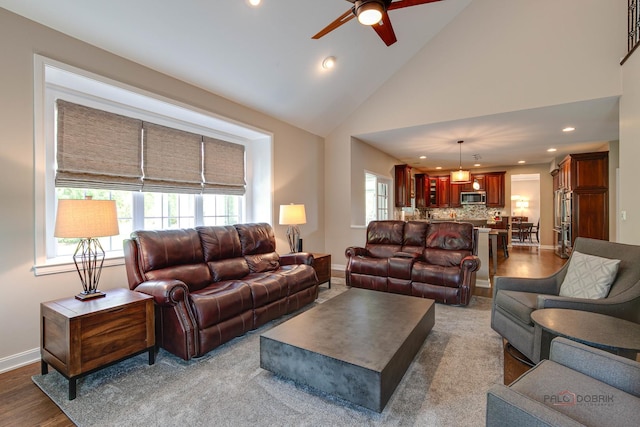 2550 Bayswater Cir, Gurnee, IL 60031 - living area with baseboards, recessed lighting, ceiling fan, high vaulted ceiling, and wood finished floors