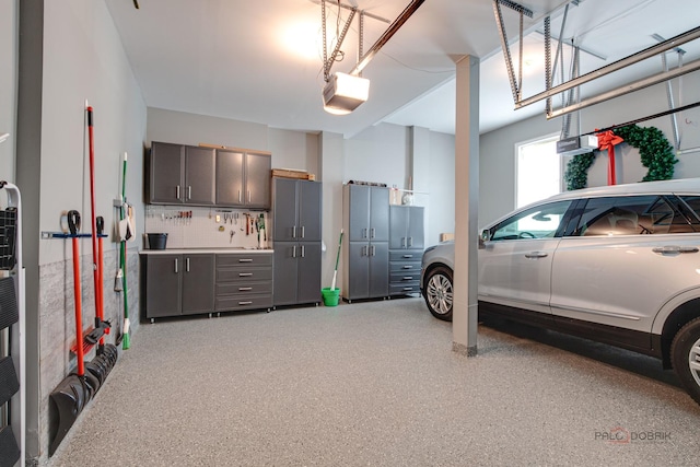 2550 Bayswater Cir, Gurnee, IL 60031 - garage featuring a garage door opener