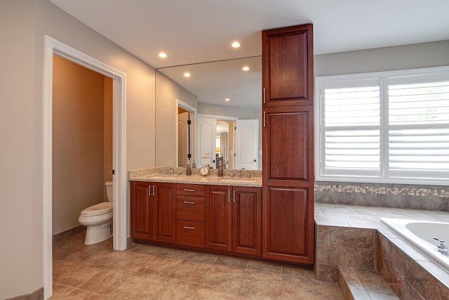2550 Bayswater Cir, Gurnee, IL 60031 - bathroom featuring double vanity, a bath, toilet, and recessed lighting